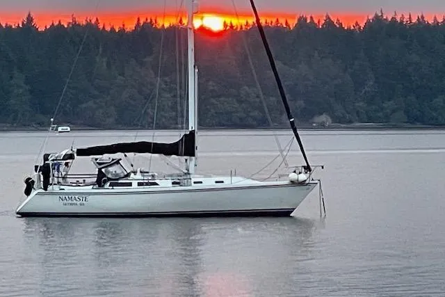 The Image of Catalina 42 sailboat on calm water at sunset, 1989 model. - 0