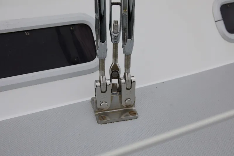 Slide: The Image of Close-up of rigging hardware on a 1989 Catalina 42 sailboat deck. - 15