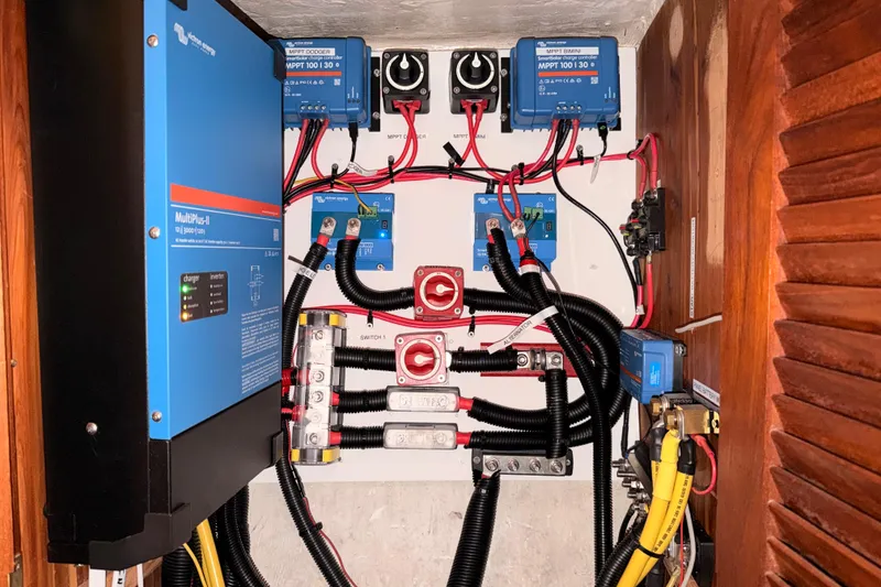 Slide: The Image of Electrical system setup in a 1989 Catalina 42 sailboat, featuring Victron Energy components. - 45