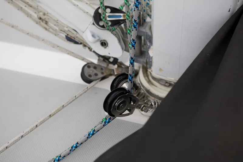 Slide: The Image of Close-up of Catalina 42 sailboat rigging and pulleys, 1989 model. - 9