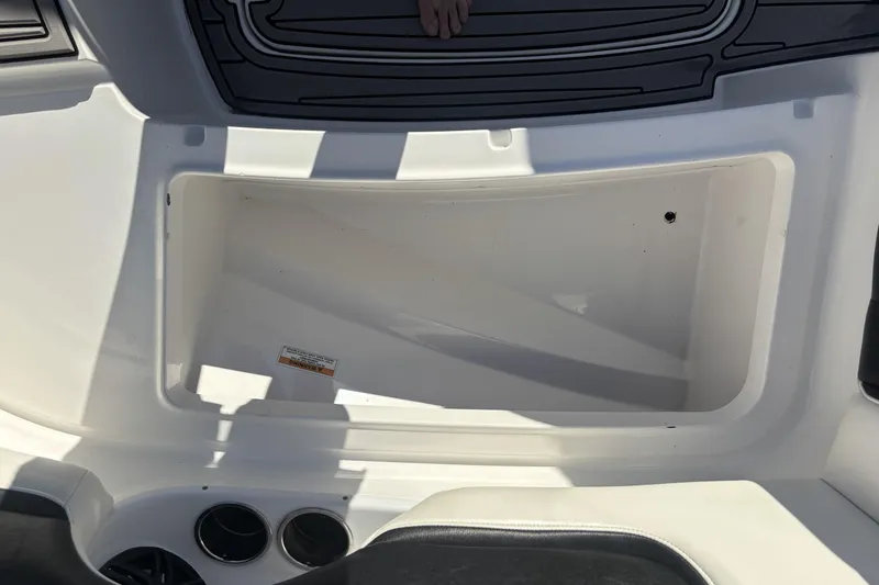 Slide: The Image of Storage compartment on a 2014 Hurricane SunDeck 2690 OB boat. - 12