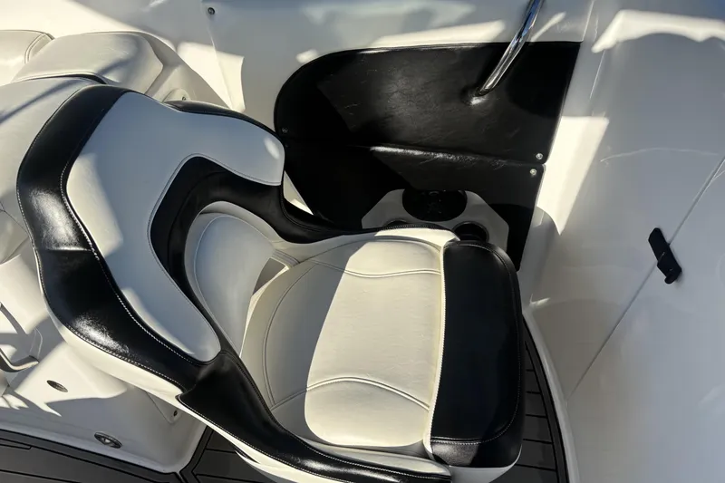 Slide: The Image of 2014 Hurricane SunDeck 2690 OB boat seat, black and white leather design. - 7