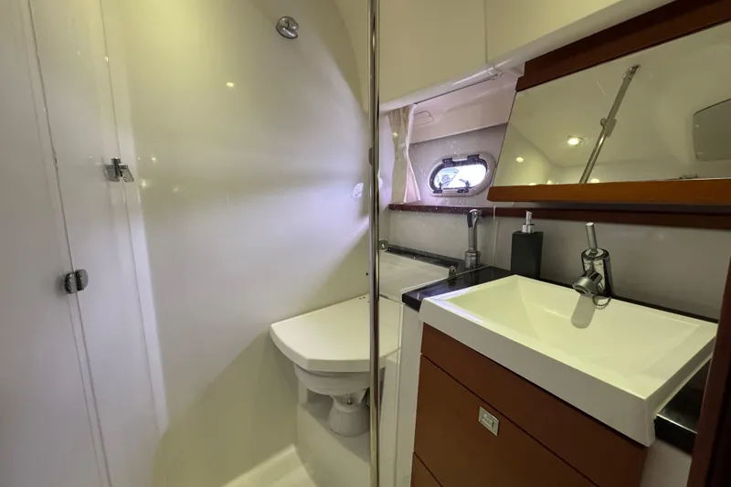 Slide: The Image of Bathroom interior of 2014 Prestige 400 yacht with modern fixtures. - 21