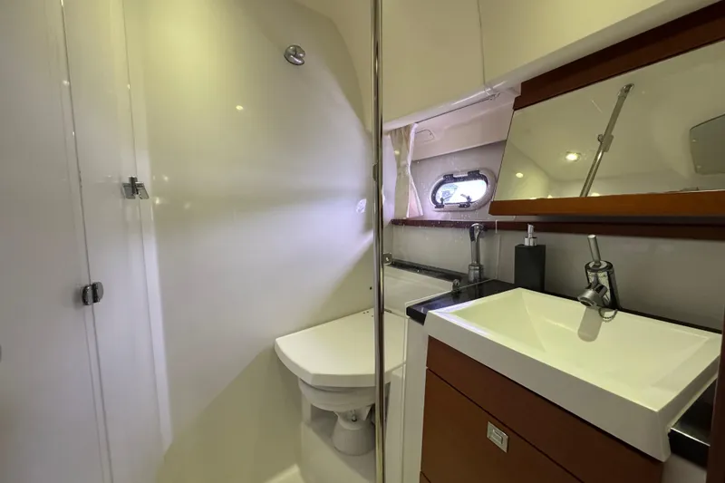 Slide: The Image of Luxurious bathroom in 2014 Prestige 400 yacht with modern fixtures and sleek design. - 22