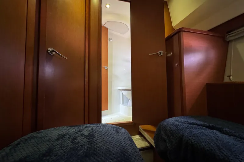 Slide: The Image of Interior of 2014 Prestige 400 yacht showing cozy cabin and bathroom. - 25