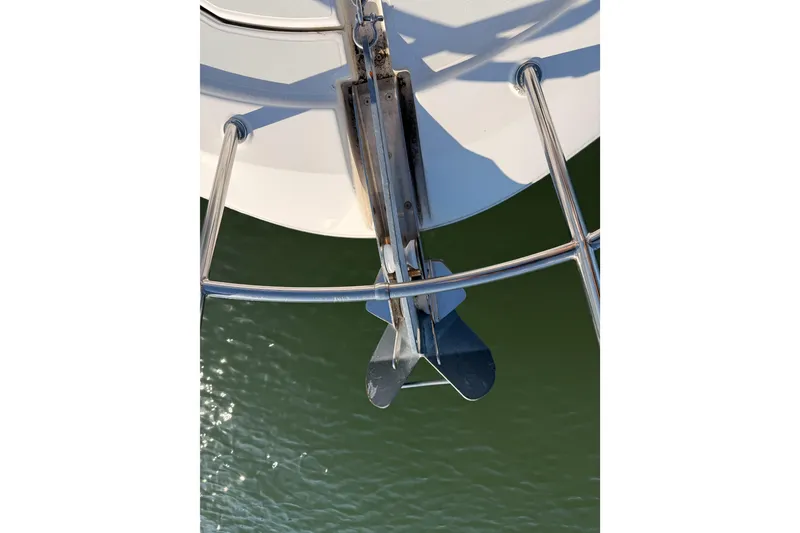 Slide: The Image of Bow anchor of a 2014 Prestige 400 yacht over water. - 37