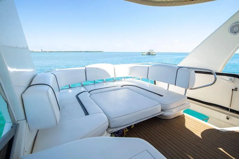 Slide: The Image of Luxurious seating on 2005 Sea Ray 420 Sedan Bridge yacht with ocean view. - 12