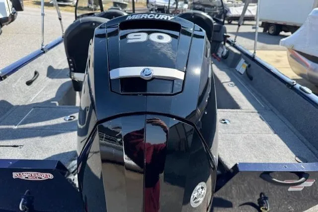 Slide: The Image of 2023 Tracker Pro Guide V-16 WT boat with Mercury 90 engine, rear view. - 6