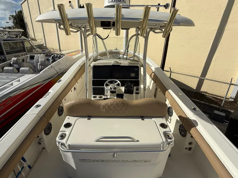 Slide: The Image of 2006 Hydra-Sports Vector 3300 CC boat interior with Garmin equipment and seating. - 12