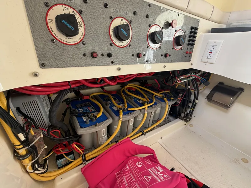 Slide: The Image of Electrical panel and battery setup in a 2006 Hydra-Sports Vector 3300 CC boat. - 16