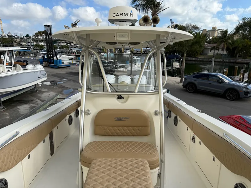 Slide: The Image of 2006 Hydra-Sports Vector 3300 CC boat with Garmin equipment, docked at a marina. - 19