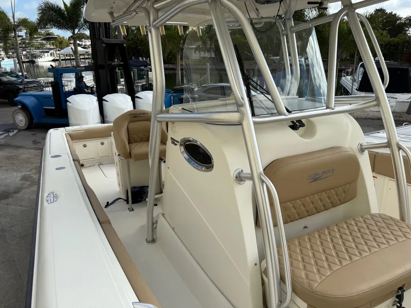 Slide: The Image of 2006 Hydra-Sports Vector 3300 CC boat with tan seating and stainless steel railings. - 23