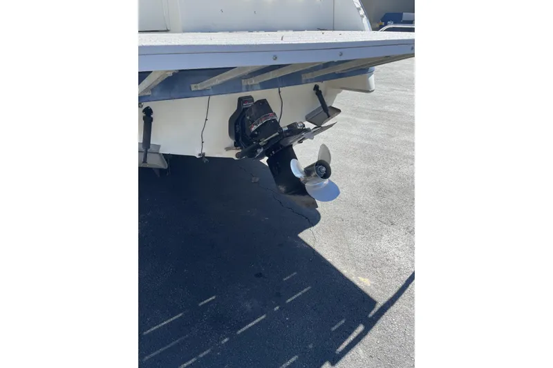 Slide: The Image of 1993 Monterey 250 Cruiser boat stern with propeller in sunlight. - 3