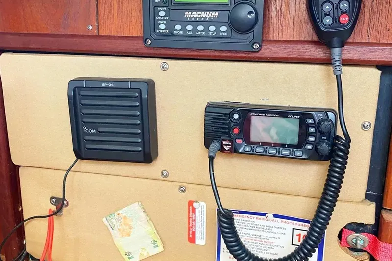 Slide: The Image of Control panel of a 1975 Whitby 42 Ketch with radio and communication equipment. - 31