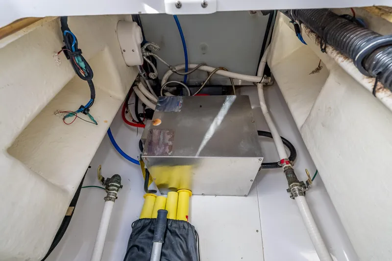 Slide: The Image of 2019 Everglades 340 Dual Console boat interior wiring and plumbing system. - 62