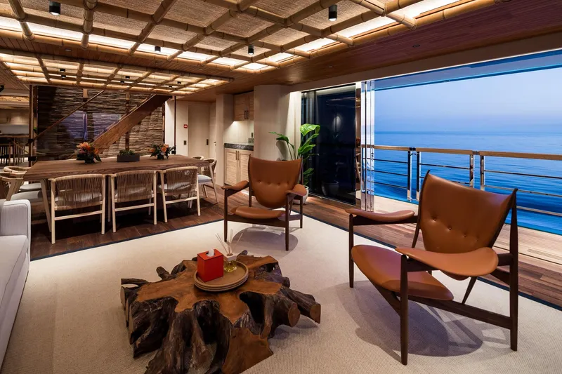 Slide: The Image of Luxurious 2024 Dunya Yachts Explorer deck with ocean view, featuring elegant outdoor seating. - 10