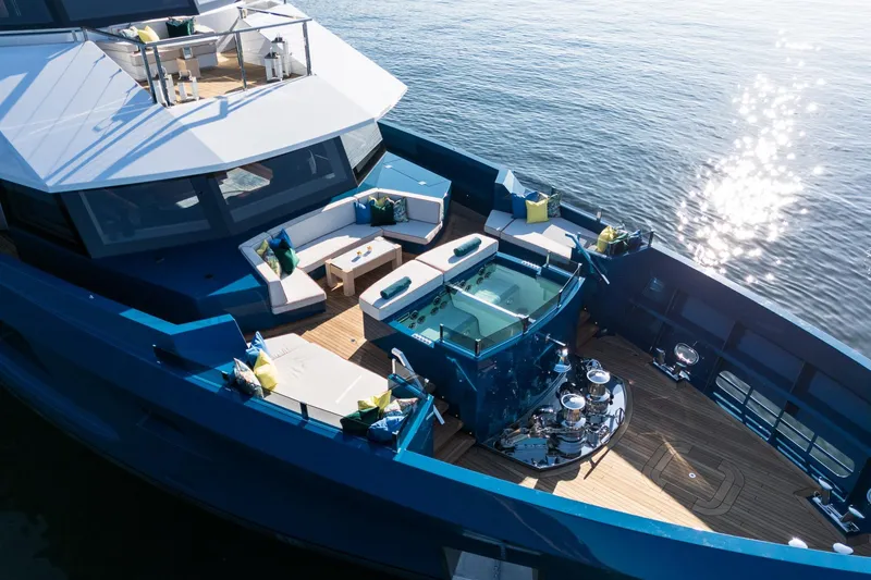 Slide: The Image of Luxurious 2024 Dunya Yachts Explorer with spacious deck and elegant seating area. - 12