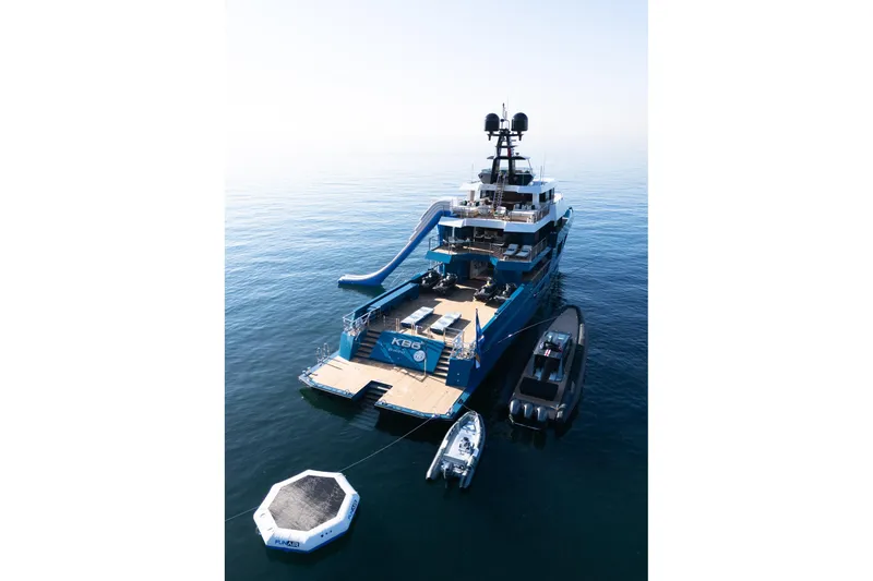 Slide: The Image of 2024 Dunya Yachts Explorer with slide and tenders on calm sea. - 17