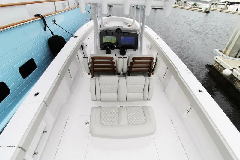 Slide: The Image of 2024 Jupiter 34 HFS boat interior with seating and navigation system. - 8