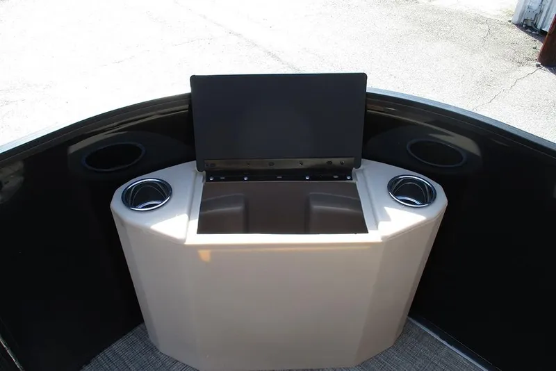 Slide: The Image of 2026 Bentley Pontoons Fish 200 FWD CW with open storage compartment and cup holders. - 14