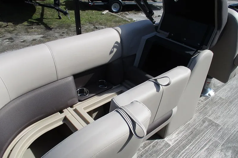 Slide: The Image of 2026 Bentley Pontoons Fish 200 FWD CW interior seating with cup holders and storage. - 17