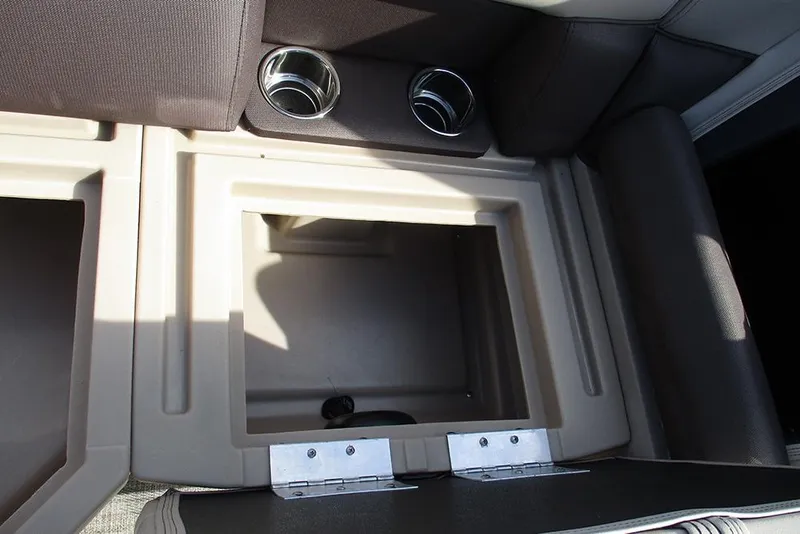 Slide: The Image of 2026 Bentley Pontoons Fish 200 FWD CW interior storage compartment with cup holders. - 19