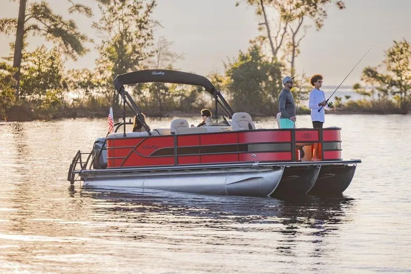 Slide: The Image of Manufacturer Provided Image: 2026 Bentley Pontoons Fish 200 FWD CW on a serene lake, people fishing. - 2