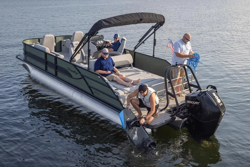 Slide: The Image of Manufacturer Provided Image: 2026 Bentley Pontoons Fish 200 FWD CW on water with passengers and Mercury engine. - 3