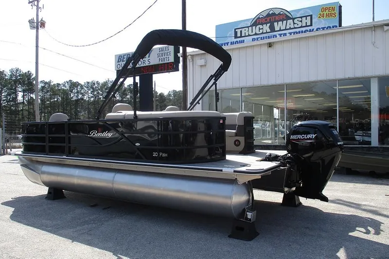 Slide: The Image of 2026 Bentley Pontoons Fish 200 FWD CW at dealership, featuring Mercury outboard motor. - 5