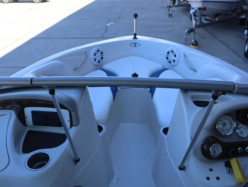 Slide: The Image of Interior view of a 2010 Tahoe Q71 21 boat with control console. - 11