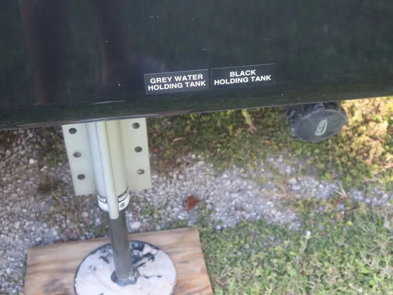 Slide: The Image of JAYCO North Point 382FLRB 2023 waste holding tank labels. - 18