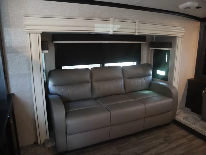 Slide: The Image of 2023 JAYCO North Point 382FLRB RV with gray sofa. - 23