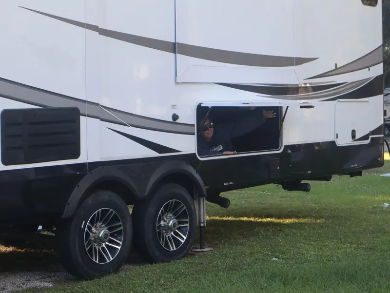 Slide: The Image of 2023 JAYCO North Point RV with open storage compartment. - 5