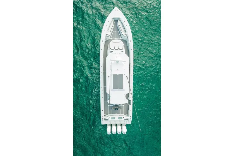 Slide: The Image of Aerial view of 2024 Yellowfin 54 Offshore boat on turquoise water. - 7