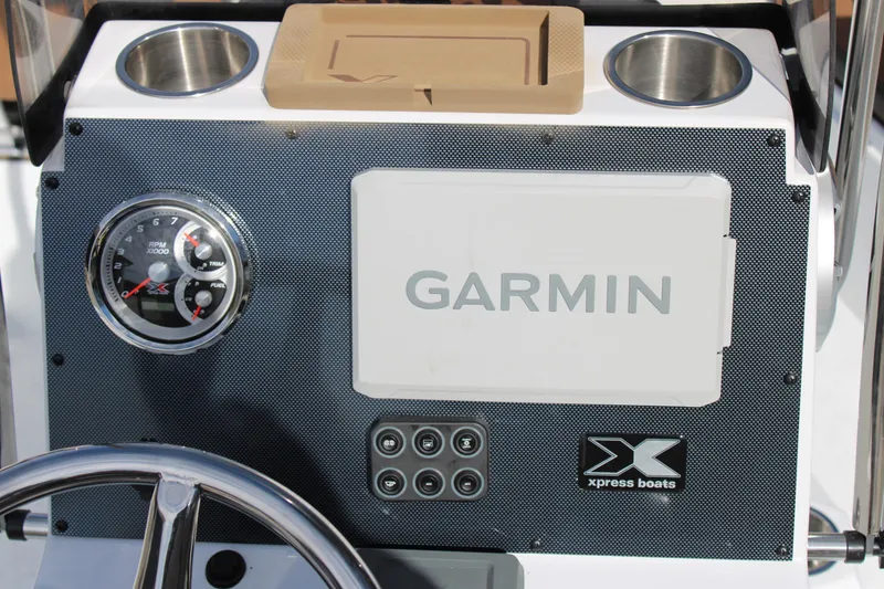 Slide: The Image of Dashboard of 2026 Xpress XR21B Bay boat with Garmin display and gauges. - 7
