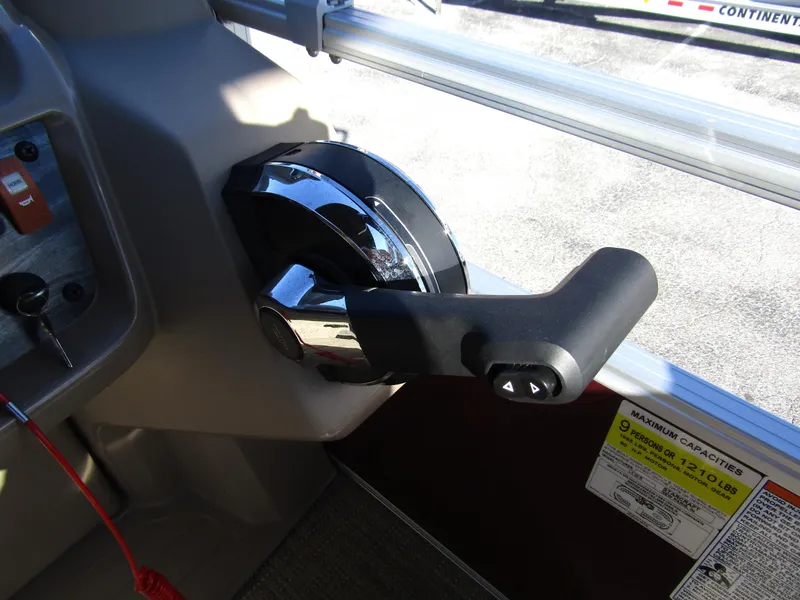 Slide: The Image of 2024 Starcraft LX 20 R boat throttle control lever, close-up view. - 16