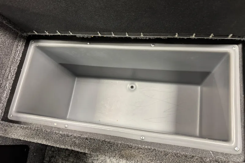 Slide: The Image of Empty storage compartment in 2026 Tracker Targa V-19 WT boat. - 11