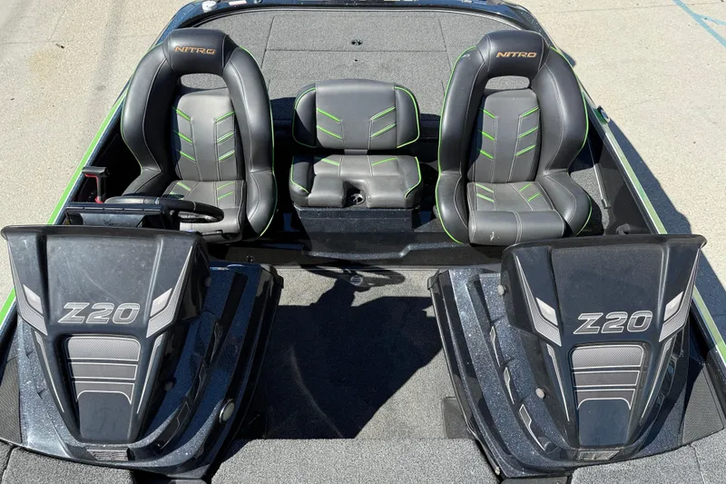 Slide: The Image of 2020 Nitro Z20 boat interior with dual seats and steering console. - 13