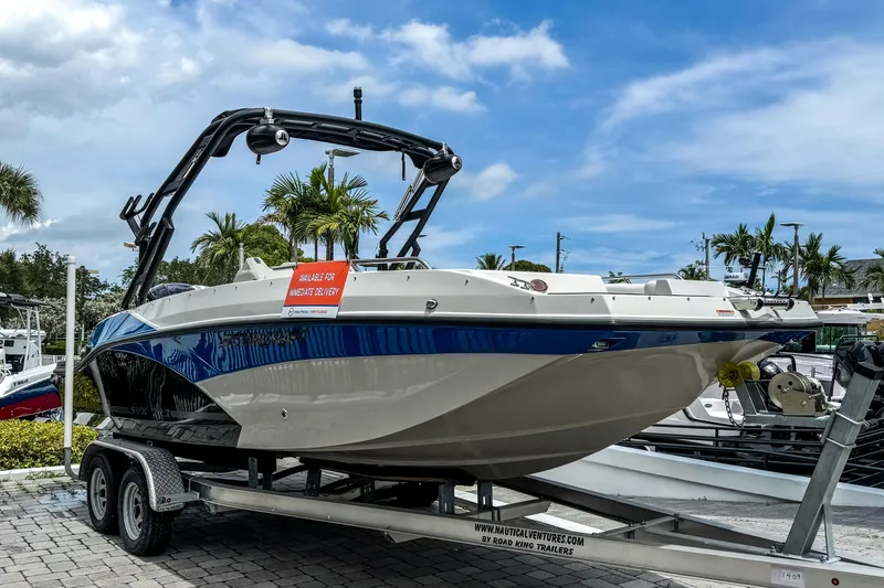Slide: The Image of 2024 Starcraft SVX 211 OB boat on trailer, available for immediate delivery. - 0
