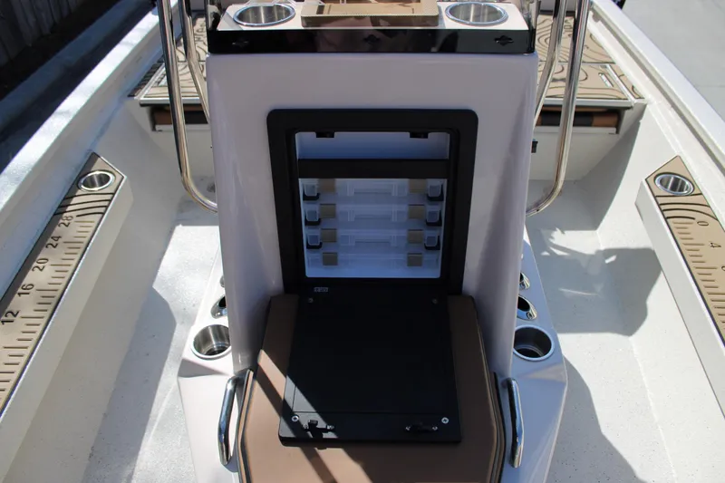 Slide: The Image of 2026 Xpress H20B Bay boat console with storage and cup holders. - 10