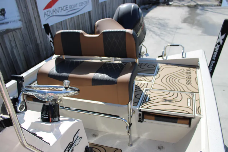 Slide: The Image of 2026 Xpress H20B Bay boat interior with stylish seating and modern design. - 12