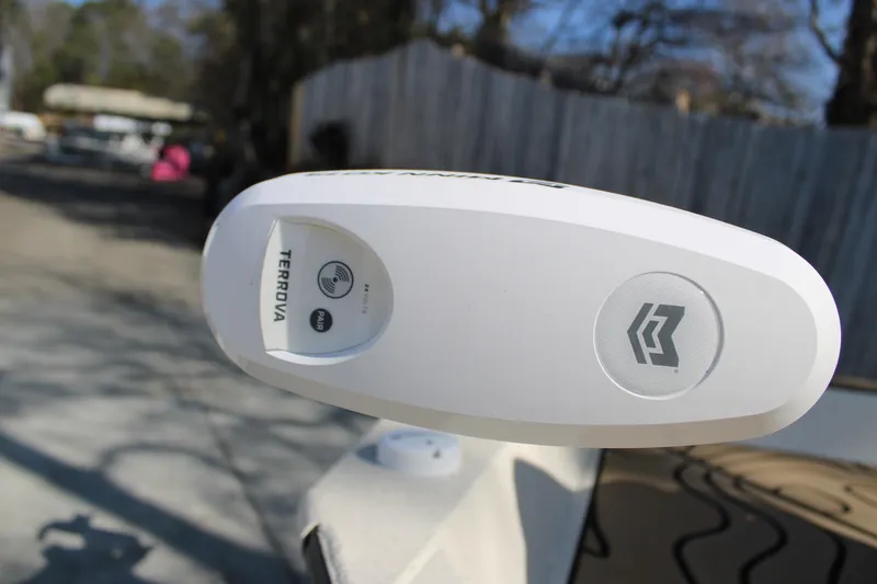 Slide: The Image of Close-up of 2026 Xpress H20B Bay boat's Terrova motor control panel. - 17