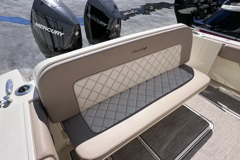 Slide: The Image of 2022 Chris-Craft Catalina 30 boat seat with quilted design and Mercury engines. - 16