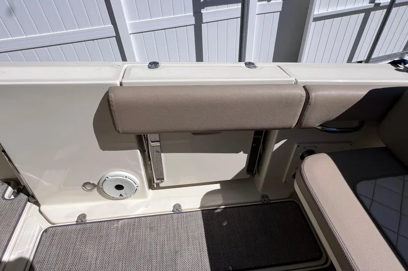 Slide: The Image of 2022 Chris-Craft Catalina 30 interior detail with beige seating and deck features. - 21