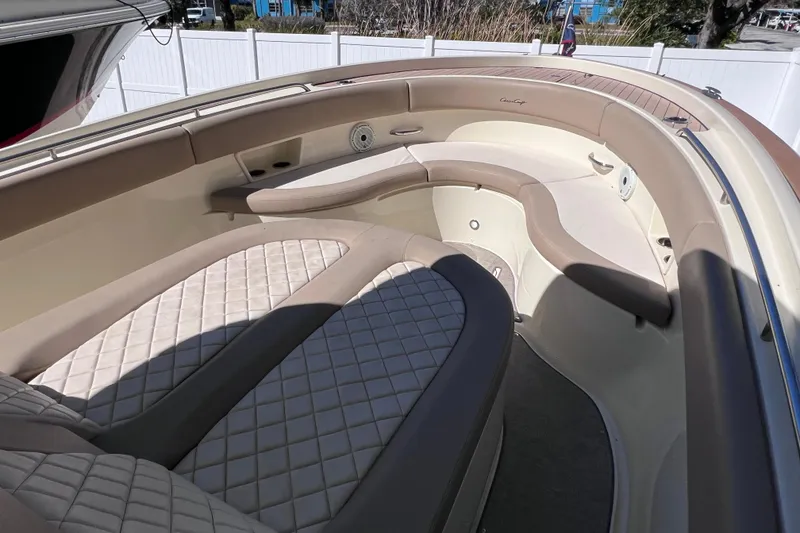 Slide: The Image of 2022 Chris-Craft Catalina 30 boat interior with luxurious seating and elegant design. - 39