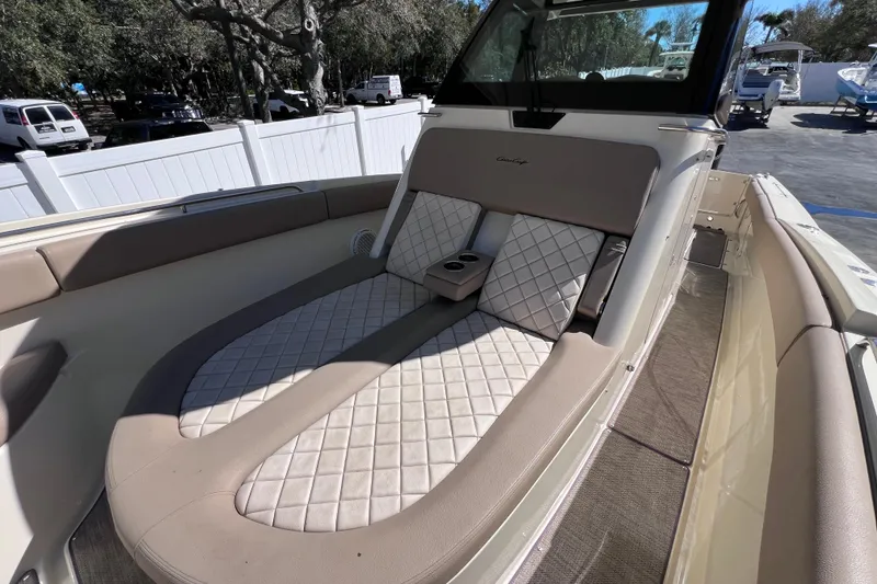 Slide: The Image of 2022 Chris-Craft Catalina 30 boat with luxurious seating and elegant design. - 41