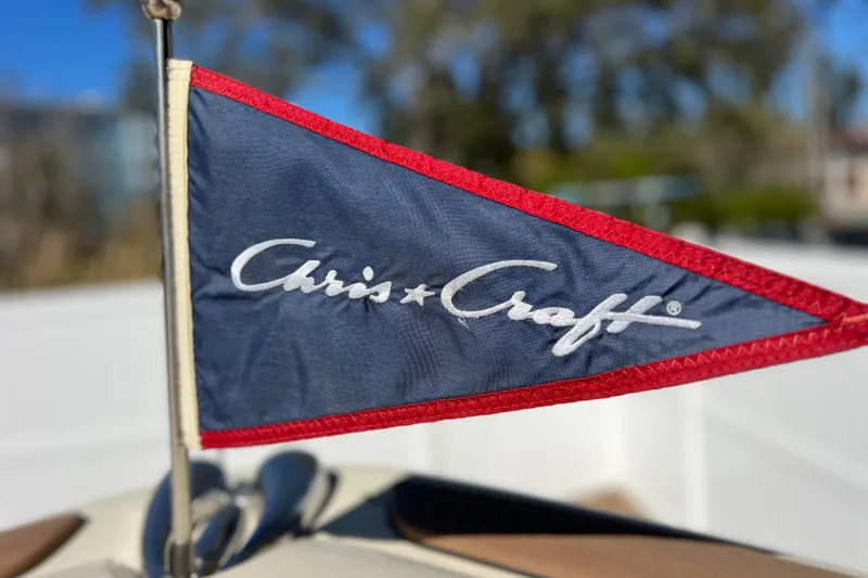 Slide: The Image of Chris-Craft Catalina 30 flag, 2022 model, with blue and red design. - 42