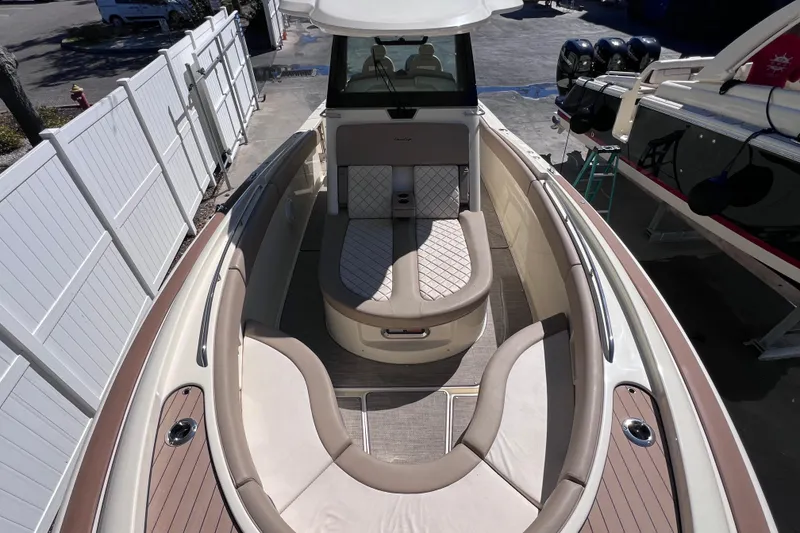 Slide: The Image of 2022 Chris-Craft Catalina 30 boat interior with luxurious seating and elegant design. - 44