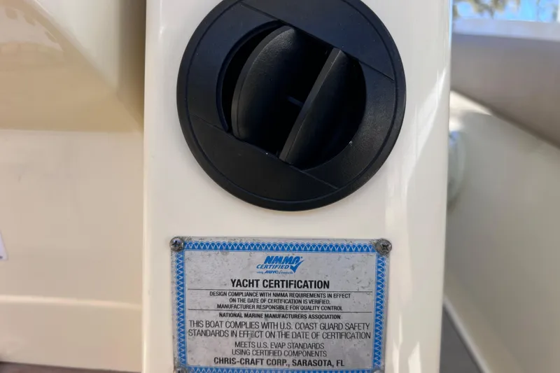 Slide: The Image of 2022 Chris-Craft Catalina 30 yacht certification plaque and vent detail. - 58