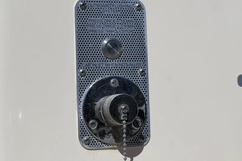 Slide: The Image of Outboard flushing system on 2022 Chris-Craft Catalina 30 boat, detailed view. - 60